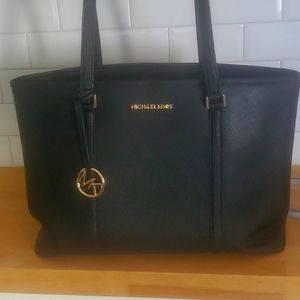 Michael Kors Black Tote, good condition. Light fraying on 1 shoulder strap.